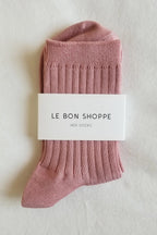 Her Socks in Desert Rose