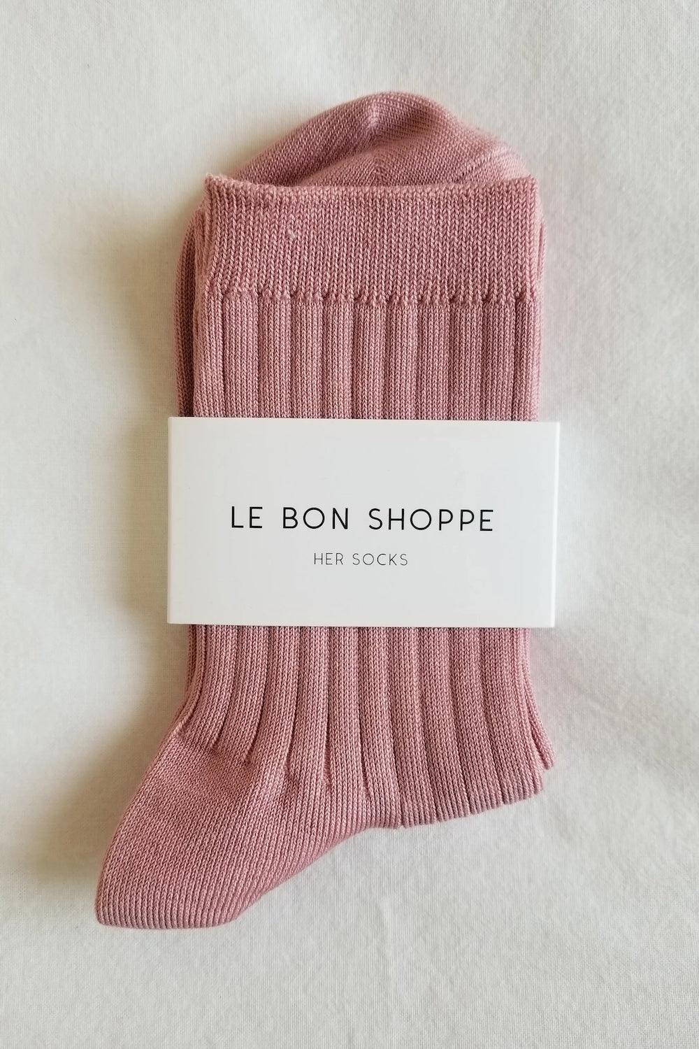 Her Socks in Desert Rose