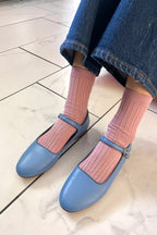 Her Socks in Desert Rose
