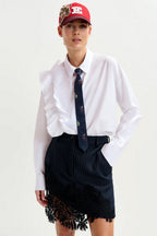 Interior Pinstripe Asymmetric Skirt with Lace Applique in Black