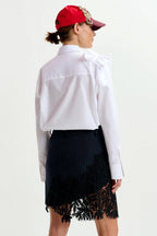 Interior Pinstripe Asymmetric Skirt with Lace Applique in Black