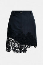 Interior Pinstripe Asymmetric Skirt with Lace Applique in Black
