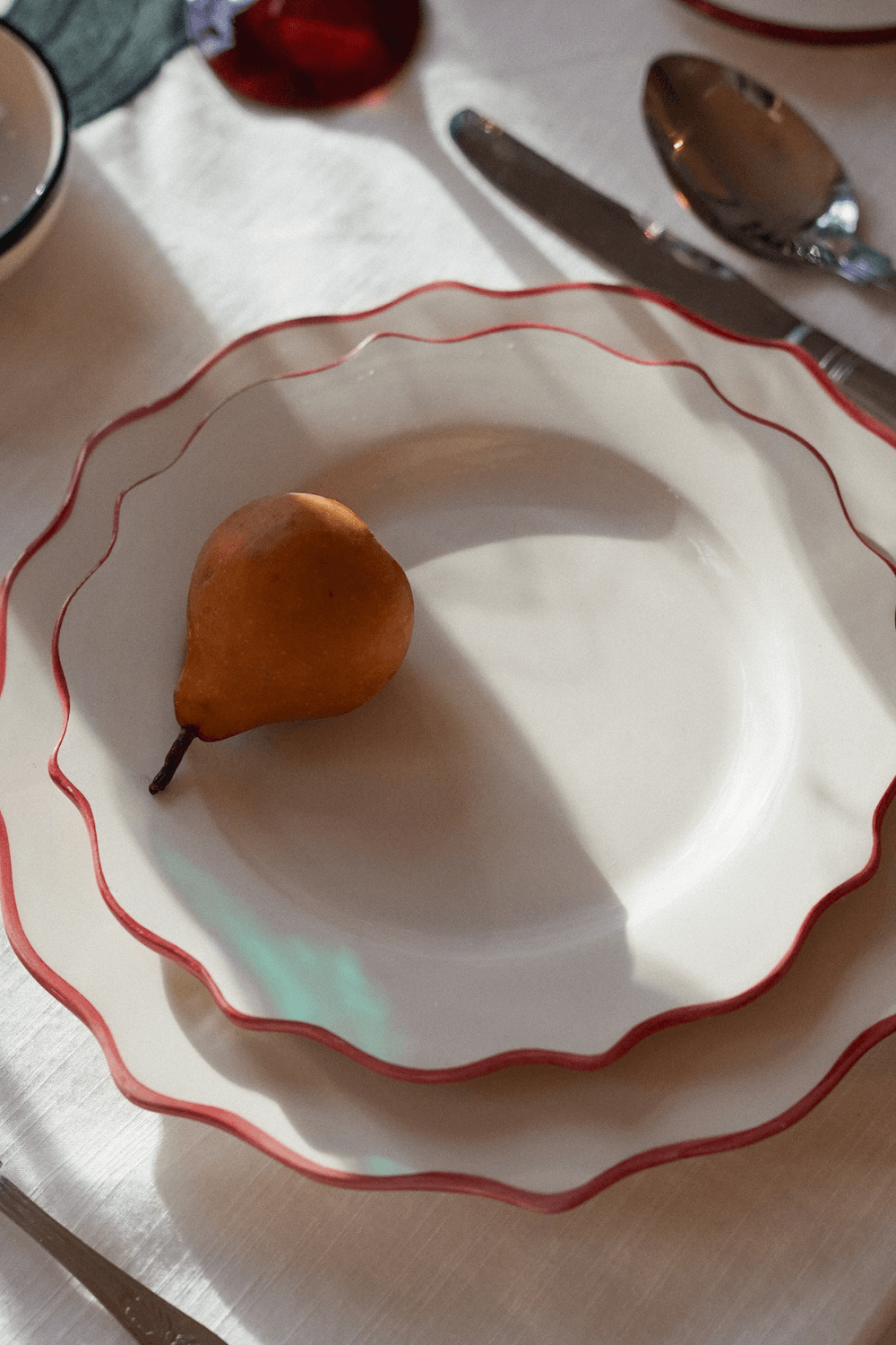 Carmine Scalloped Dinner Plate in Red