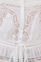 Gene Cami in White