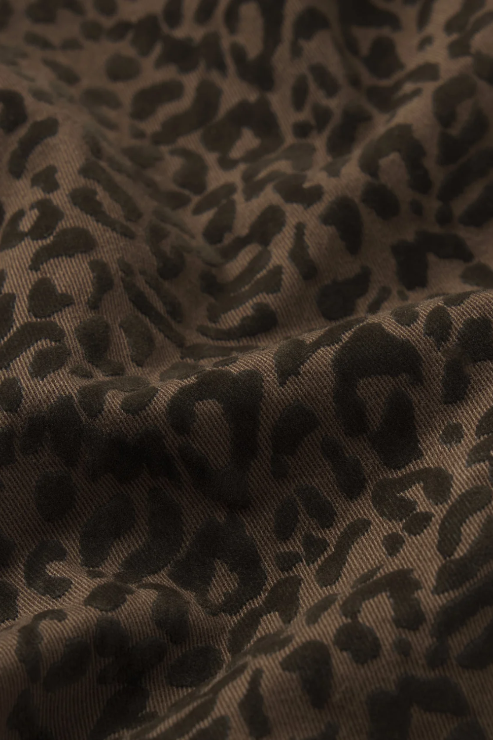 The Bow High Rise Curved Leg Crop Flocked in Sandcat