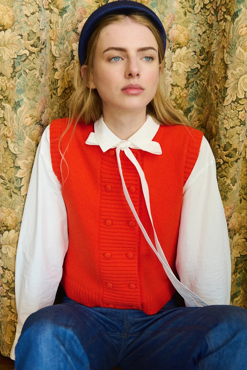 The Tiny Big Sister Buttoned Merino Wool Vest in Red