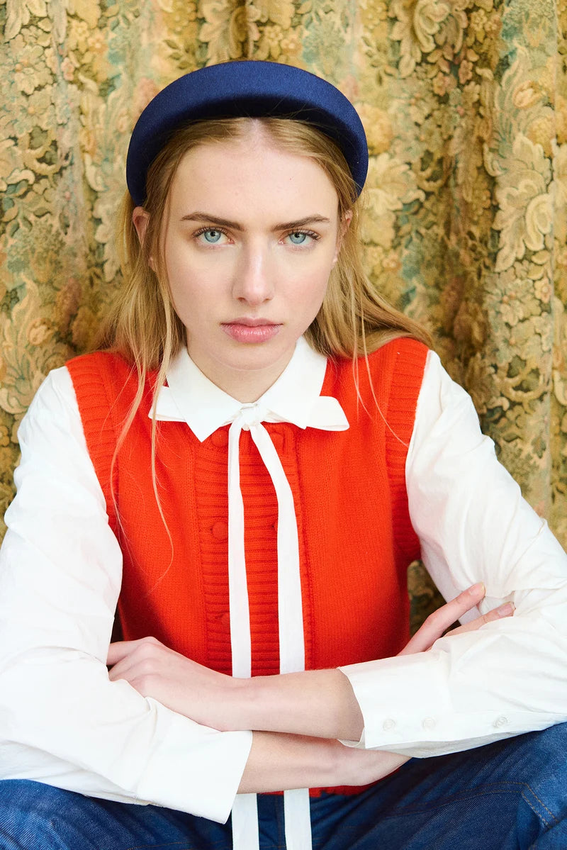 The Tiny Big Sister Buttoned Merino Wool Vest in Red