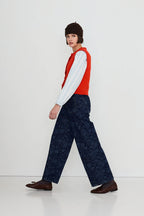 The Tiny Big Sister Buttoned Merino Wool Vest in Red