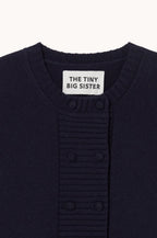 The Tiny Big Sister Buttoned Merino Wool Cardigan in Navy