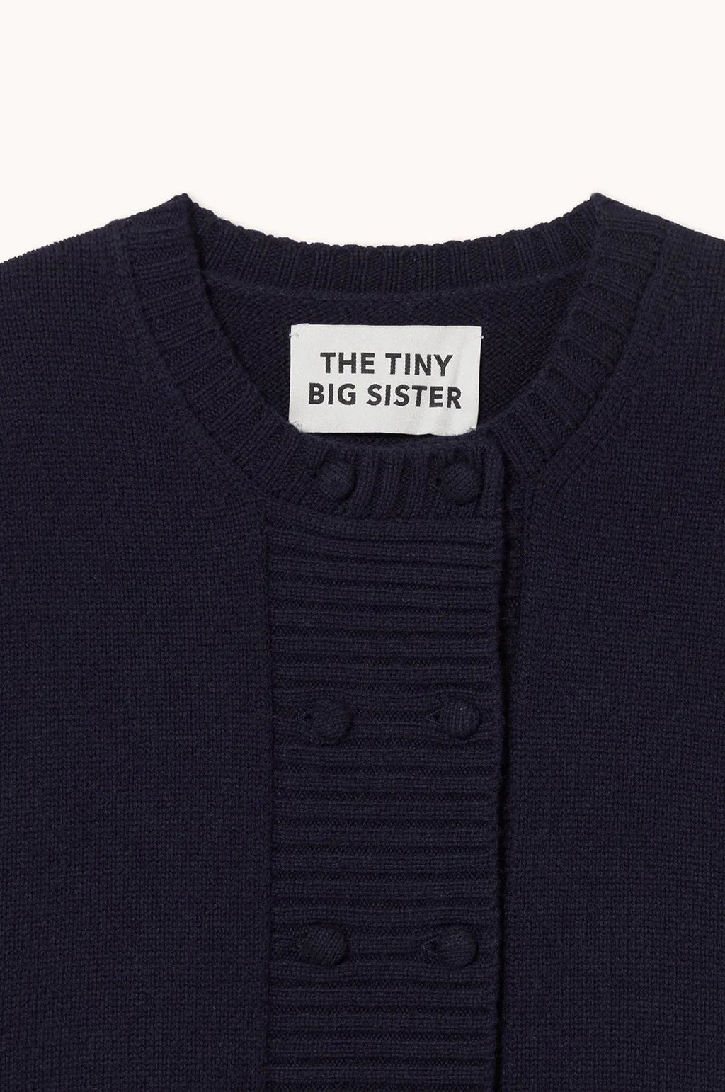 The Tiny Big Sister Buttoned Merino Wool Cardigan in Navy