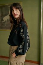 Indi & Cold Cross Stitch Detail Long Sleeve Blouse in Washed Black